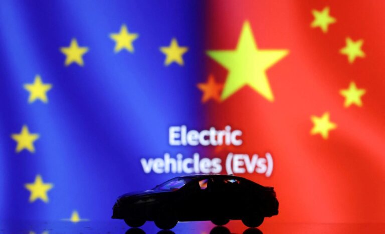 Illustration shows Car miniature, "Electric vechicles (EVs)" words, EU and Chinese flags